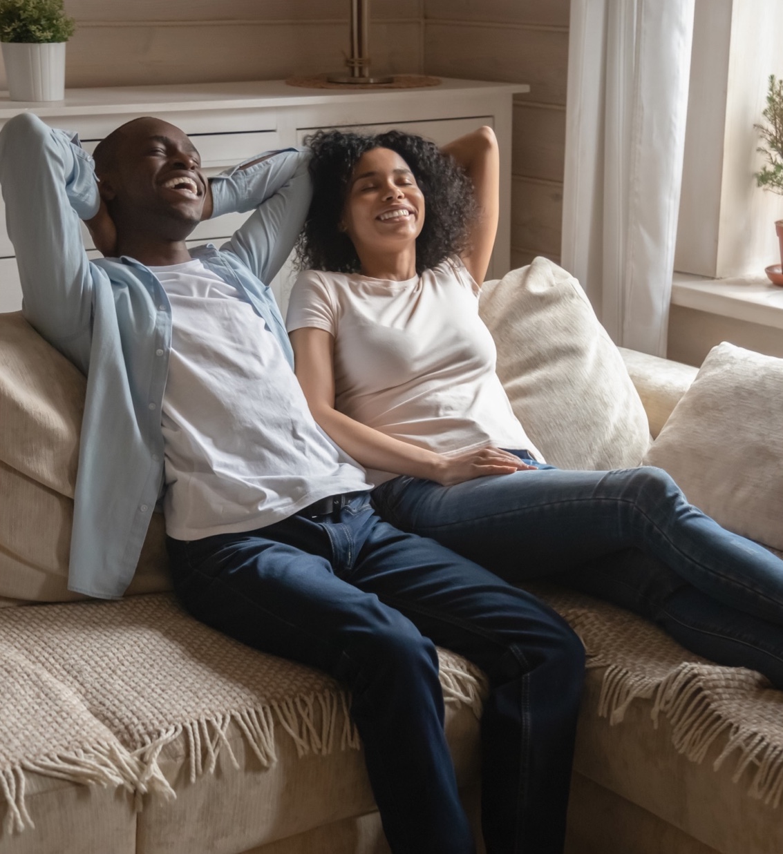 a couple relaxes in bed