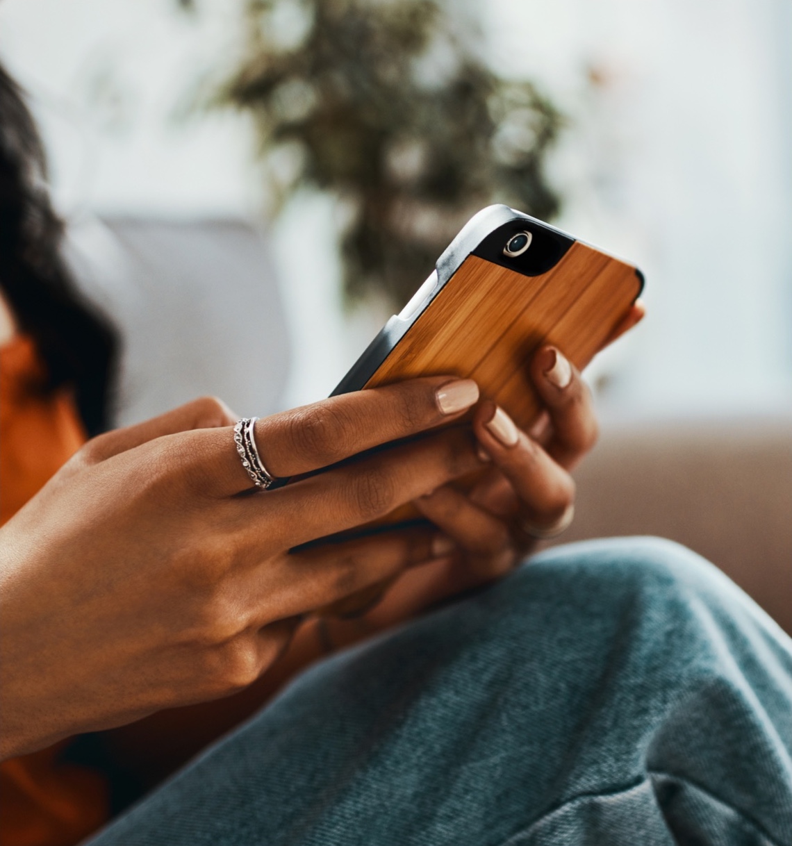 woman works on smartphone